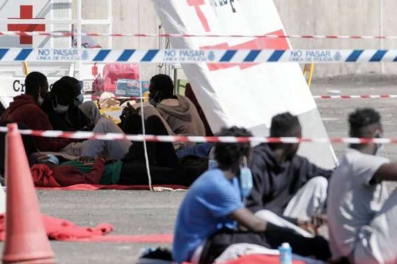 Tents are being installed at ports in the Canary Islands to accommodate migrant minors