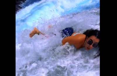 VIDEO: Moment woman is almost swept into the sea trying to get the ‘perfect’ holiday photo