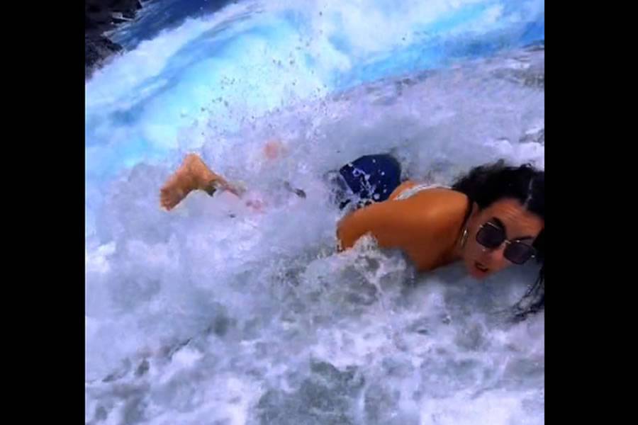 VIDEO: Moment woman is almost swept into the sea trying to get the ‘perfect’ holiday photo