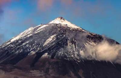 Contrasts in Canary Islands weather: Snow on Teide, heat and haze elsewhere
