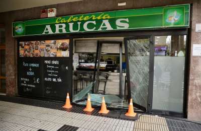 Thieves crash car into café to rob it but flee empty-handed