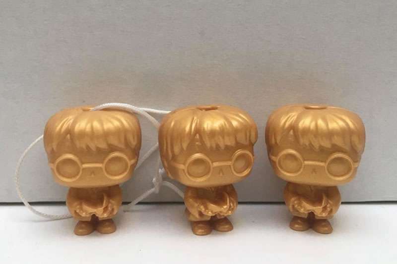 Young girl's magical luck as she finds three rare Harry Potter Funko Figures in Kinder eggs