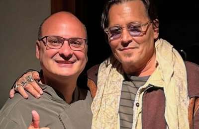 Johnny Depp surprises guests and staff at a restaurant in Tenerife