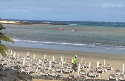 Dead swimmer is retrieved from the sea off Costa Teguise