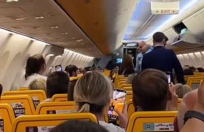 British woman dragged off Ryanair flight after mid-air disruption forces unscheduled landing