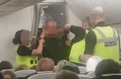 VIDEO: Drunk passenger punches flight attendant and causes panic on TUI flight from the Canary Islands