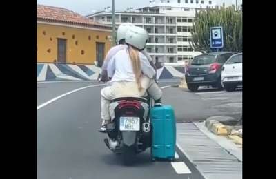 VIDEO: Motorcyclist drags suitcase through streets of Tenerife, sparking outrage