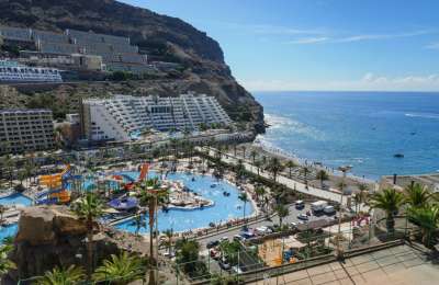 How tourists relax in the Canary Islands with beaches bars and online fun