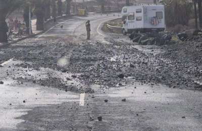 High tides flood the promenade in South Tenerife
