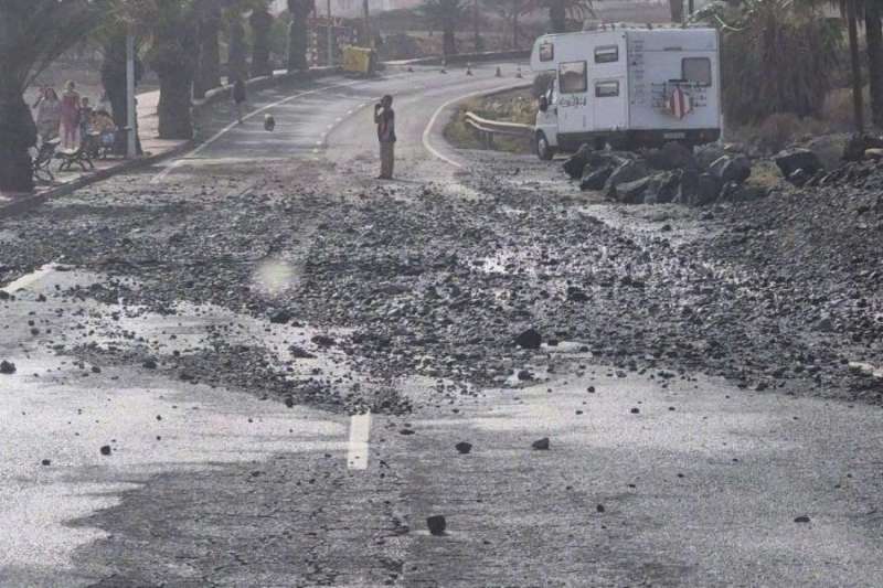 High tides flood the promenade in South Tenerife
