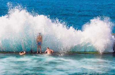 Two women swept into the sea at Los Gigantes pool