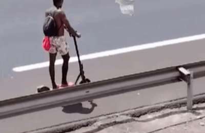 Electric scooter rider filmed on the TF-1 motorway in south Tenerife