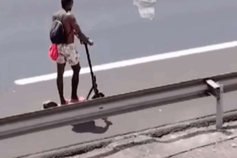 Electric scooter rider filmed on the TF-1 motorway in south Tenerife