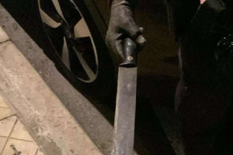 Man arrested for strangling his mother and threatening her with a machete