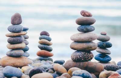 Stacking stones at Maspalomas Beach harms wildlife and weakens the coast