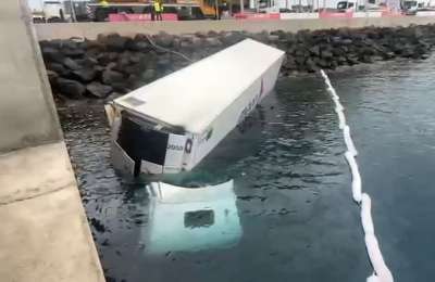 Lorry falls into the sea at ferry port in Gran Canaria