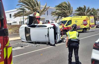 Driver rescued after car flips onto side in Costa Teguise