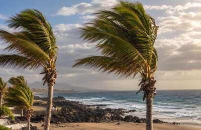 WEEKEND WEATHER: Still hot with light haze and strong winds after a wet Friday