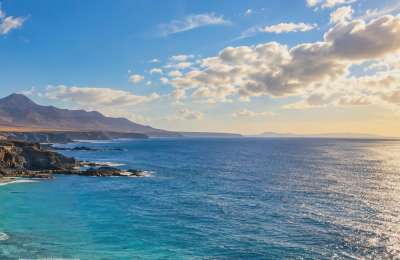 FRIDAY WEATHER:  Cloudy skies and fading calima across the Canary Islands
